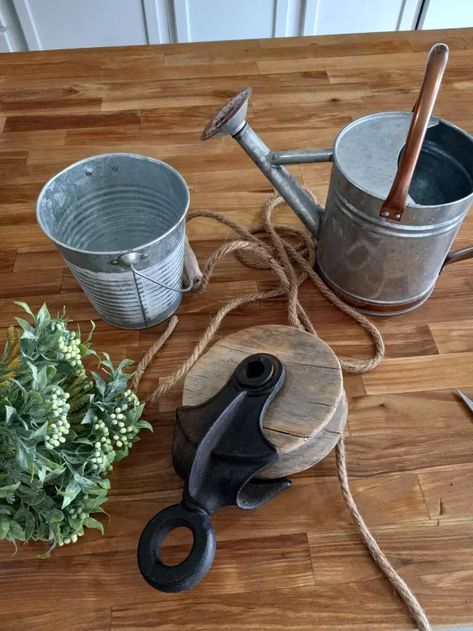 How I Made a Farmhouse Pulley and Bucket Planter | Hometalk Dollar Tree Plant Hanger, Galvanized Bucket Planters, Step Decor, Repotting Succulents, Bucket Decor, Backyard Escape, Cute Farmhouse, Bucket Planters, Pallet Storage