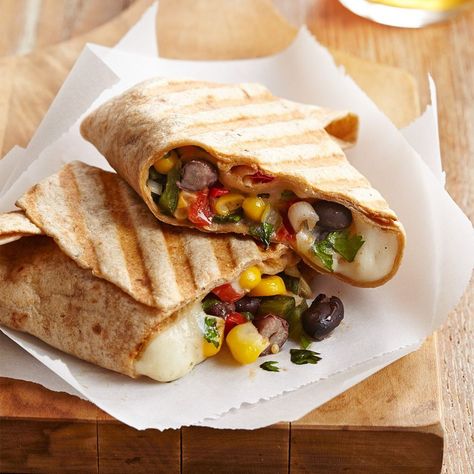 These easy wraps are filled with black beans, corn, red pepper and creamy queso. They cook up quickly in a panini press. Easy Wraps, Black Beans Corn, Panini Press, Low Carb Flour, Skillet Cooking, Chile Pepper, Stuffed Poblano Peppers, Low Cholesterol, Monterey Jack Cheese