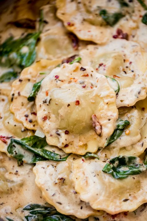 Easy Date Night Creamy Tuscan Ravioli Recipe - Little Spice Jar Easy Dinner Recipes With Mozzarella, Ravioli Without Red Sauce, New In Food, Alfredo Cheese Ravioli, Ravioli In Creamy Garlic And Spinach White Sauce, Mushroom Ravioli With Spinach, Mushroom Ravioli Sauce Easy, Spring Supper Ideas, White Sauce For Ravioli