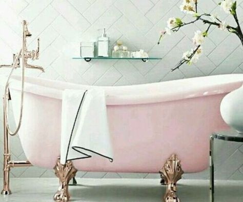 a pink slip freestanding bathtub with rose gold legs and bathtub filler for a feminine space Footed Bathtub, Drømme Bad, Pink Tub, Luxurious Bathtubs, Pink Bathroom Decor, Vintage Tub, Tub Ideas, Pink Baths, Brown Bathroom