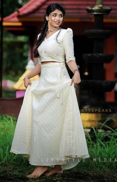 Traditional Dresses Skirt Top, Pavada And Top Model, Skirt And Crop Top For Onam, Onam New Model Dress, Traditional Skirt Design, Kerala Style Skirt And Top For Onam, Kasavu Pattupavada For Women, Onam Blouse Design For Skirt, Kasavu Skirt And Top Designs