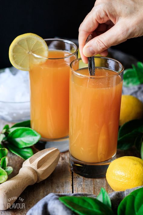 This delicious tropical drink is so refreshing, you’ll want a refill! This copycat Chick-fil-A recipe for mango passion tea is made with homemade lemonade, unsweet tea, mango nectar, and passionfruit juice. Mango Nectar Drinks, Mango Nectar Recipes, Passionfruit Juice, Chick Fil A Recipe, Mango Iced Tea, Grinch Punch, Passion Tea Lemonade, Passion Fruit Tea, Simply Lemonade