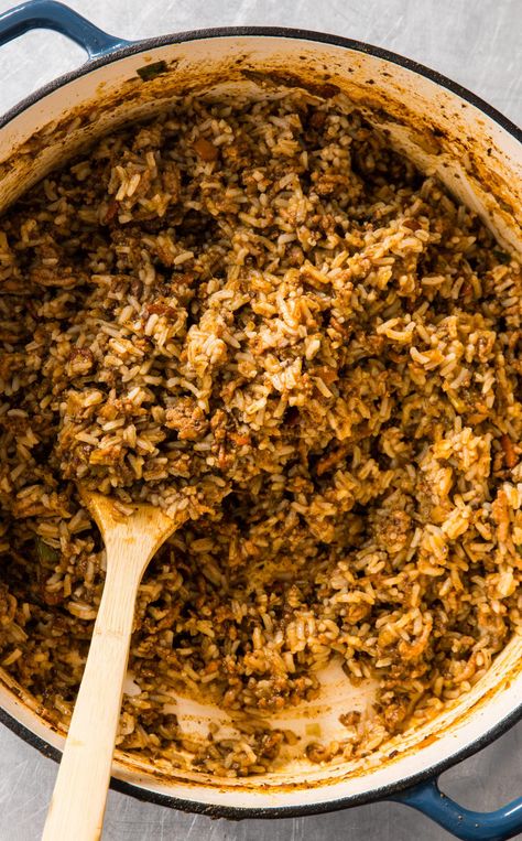 Cajun Rice Dressing: Make room for this Louisiana specialty, Cajun Rice Dressing, on your Thanksgiving dinner table. Packed with meaty flavor and the holy trinity of onions, celery, and green pepper, it will be a hit at gatherings big and small. Cajun Rice Dressing, Cajun Rice, Rice Dressing, Cooks Country, Cooks Country Recipes, Cooking Onions, Creole Cooking, Chicken Liver, Meatless Main Dishes