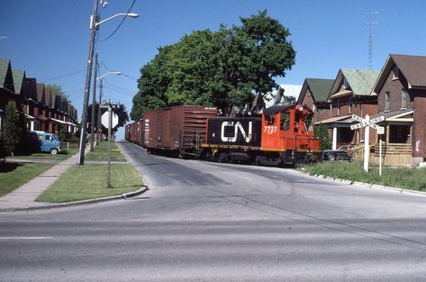 CNR ACTION SW 1200 # 7727 BRUCE ST, OSHAWA, ONT 1986. Right by my house I love in now. I was 3 when this photo was taken Railroad Images, Train Locomotive, Canadian National Railway, Above The Sink, Railroad Pictures, Last Ride, Wall Cabinets, Railroad Photography, Train Wreck