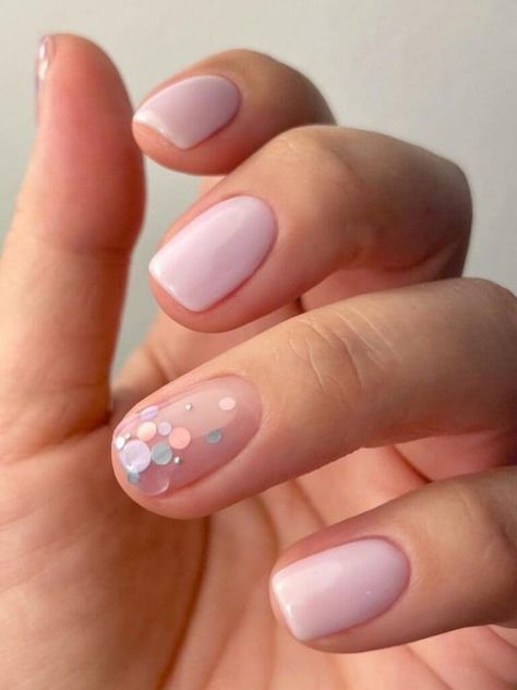 Short, pale pink nails with confetti Pastel Nail Colors Spring, Pretty Spring Nails Colors, Big Glitter Nails, Spring Korean Nails, New Years Nails 2024 Trends, Short Nail Designs Gel Spring, Spring Nails Shellac, Subtle Spring Nails, Spring Nails Lavender