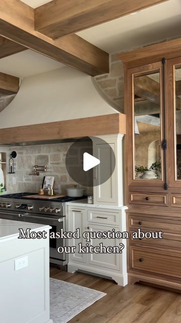 Gina Tiffany Gambatese on Instagram: "When guests come over for the first time they often comment that the fridge is so camouflaged….and I love that because that was the goal when we designed this space! 

We achieved this by building the unit into the wall rather than building cabinetry around it. We also added flush cabinets above it that go all the way to the beams and added a furniture base to the bottom. These features really elevate the entire look so much! 

The outcome is a very discreet oversized major appliance that still has a strong aesthetic presence in the room! 

We painted it to match our range wall and added coordinating hardware! 

#kitchendesignideas #kitchendecoration #customkitchen #subzeroandwolf #homedesign #homedesigninspo #stonebacksplash #backsplashideas #topknobs Fridge Wall In Kitchen, Flush Cabinets, Range Wall, Strong Aesthetic, Stone Backsplash, Top Knobs, In The Room, Custom Kitchen, The Goal