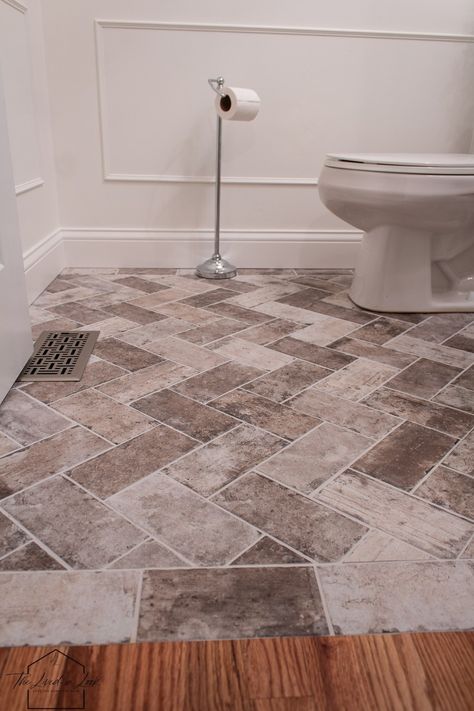 DIY Faux Brick Floor Look For Less. Find out how we achieved this gorgeous brick look tile on a budget. Head over to the blog for all the details including similar tile options and gorgeous design patterns. #bricktile #brickfloor #herringbone #bathroomfloor #herringbonetiling Faux Brick Floor, Faux Brick Flooring, Brick Tile Floor, Tile Bedroom, Brick Floor, Tile Options, Brick Look Tile, Room Tips, Unique Tile