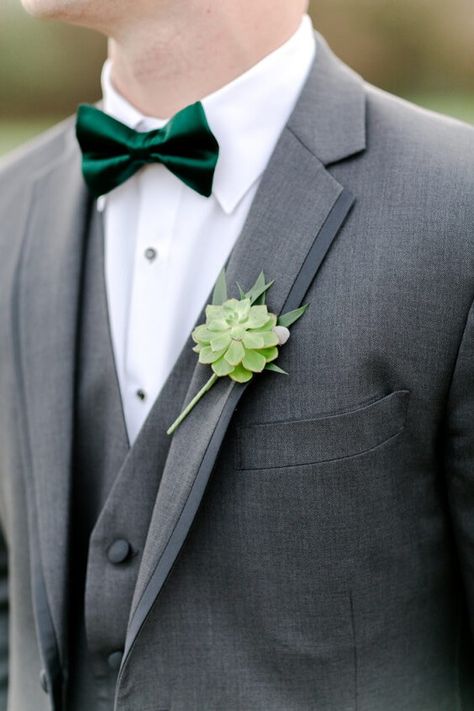 Emerald Green and Grey Winter Wedding 2020, Emerald Green Bridesmaid Dresses, Grey Suits - ColorsBridesmaid Grey Suit Green Bow Tie, Gray Grooms Suit, Emerald Green Suit, Grey Winter Wedding, Bridesmaid Dresses Grey, Emerald Green Wedding Theme, Suit Groomsmen, Succulent Boutonniere, Winter Wedding Color Palette