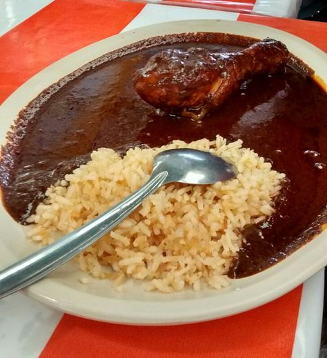 Arroz con pollo y mole. Rice, chicken leg and mole - fantastic dish! Mole is made from chilies, chocolate and many more secret ingredients! Food Dates, Mole Poblano, Rice Chicken, Mexico Food, Mexican Foods, Authentic Mexican, Chicken Legs, Mexican Recipes, Mexican Food