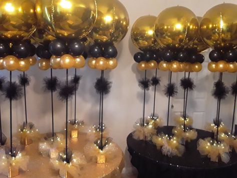 Centerpieces With Lights, Gold Centerpieces Diy, Mens Birthday Party Centerpieces, Black And Gold Centerpieces, 50th Birthday Party Ideas For Men, Black Centerpieces, Bachelor Party Decorations, Black And Gold Balloons, Lighted Centerpieces