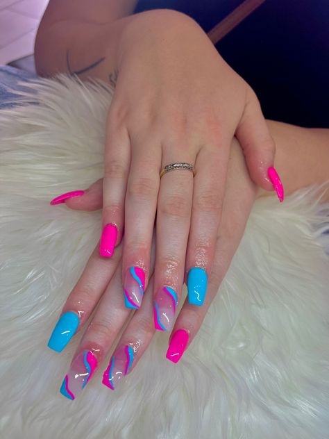 Pink and blue set with an added touch of fun with the added pink and blue color patches to the middle and index fingers. Royal Blue And Hot Pink Nails, Pink N Blue Nails, Pink And Blue Nail Ideas, Hot Pink And Blue Nails, Pink And Blue Nails Design, Blue And Pink Nails, Pink And Blue Nails, Blue Summer Nails, Hoco Nails