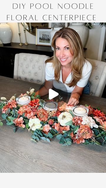 Janine Graff on Instagram: "DIY Pool Noodle Floral Centerpiece 🍂 Elevate your table decor with this easy DIY. Transform a simple pool noodle into a stunning illuminated centerpiece adorned with vibrant florals. A creative and budget-friendly way to add charm and elegance to any gathering.   Looks like a professional premade arrangement, expertly crafted, with no hint that a pool noodle is the secret behind holding your centerpiece together. Say goodbye to the hassle of dry oasis blocks with this solution!  To create your own, start by folding the pool noodle in half and sliding 2-3 wine or compote glasses in between the noodle, evenly spaced and secure with zip ties. Arrange your choice of faux florals and greens by inserting into the noodle, ensuring to start with your greenery and work Noodle Decoration Ideas, Pool Noodle Centerpiece Christmas, Pool Noodle Wine Glass Centerpiece, Diy Floral Table Centerpieces, Pool Noodle Fall Centerpiece, Pool Noodle Table Centrepiece, Pool Noodle Centerpiece Ideas Fall, Pool Noodle Floral Arrangement, Fall Centerpieces For Table Diy Pool Noodles