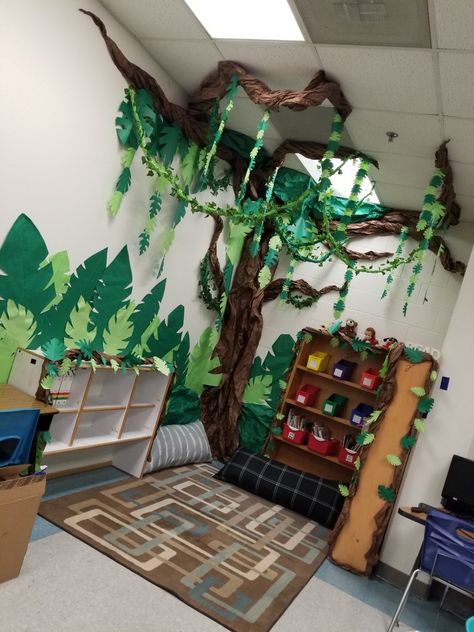 Rainforest Display Classroom, Jungle Infant Classroom, Rainforest Door Decoration, Jungle Theme Library, Jungle Reading Corner, Jungle Book Classroom Theme, Jungle Daycare Theme, Rainforest Classroom Transformation, Rainforest Room Decor