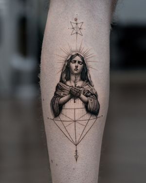 Tattoo uploaded by Delphin Musquet • Explore the beauty of fine line and micro-realism in this black & gray geometric tattoo of Mary by Delphin Musquet. Mary Tattoos Catholic, Roman Catholic Tattoos, Mother Mary Tattoo, Mary Tattoos, Mother Mary Tattoos, Micro Realism, Catholic Tattoos, Virgin Mary Tattoo, Mary Tattoo