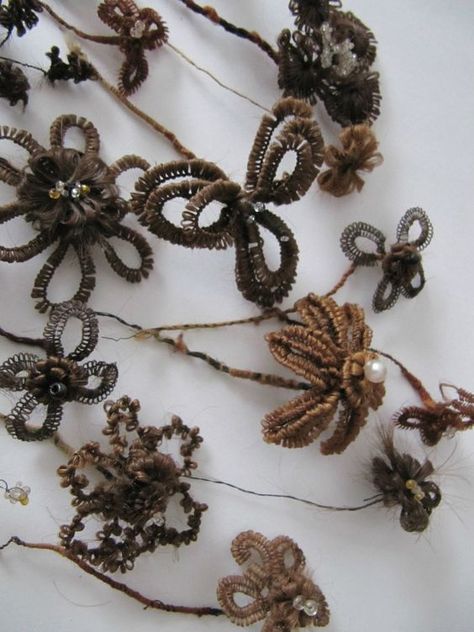 Victorian mourning ornaments made of the deceased's hair Hair Keepsake, Victorian Hair, Steampunk Festival, Victorian Hairstyles, Georgian Jewelry, Hair Wreaths, Neo Victorian, Hair Wreath, Hair Flowers