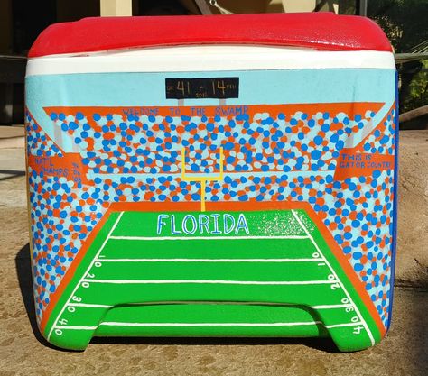 University of Florida stadium painted cooler #paintedcooler #floridagators #itsgreatuf Frat Cooler Football Field, Painted Frat Cooler Ideas, Easy Cooler Painting Ideas, Myrtle Beach Frat Cooler, College Cooler Painting, Formal Cooler Ideas Fraternity, Painting Cooler Ideas, Nashville Frat Cooler, Nola Cooler Formal