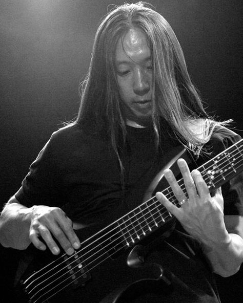 John Myung (Dream Theater). When asked,"Why pick up the bass guitar and not another instrument?" His response was: "I think it's just in the way that you hear music. When I was growing up, and even now, the first thing that I hear is the bass. It doesn't matter who the artist is or what the song is – I hear that sound first."...Same as me, John. I agree with that statement. Luisa Casati, Satanic Clothing, 80s Hair Bands, Bass Guitarist, Dream Theater, Heavy Rock, Metal T Shirts, Progressive Rock, Bass Player