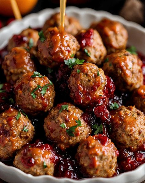 Juicy holiday meatballs glazed with a tangy cranberry & orange sauce make the perfect festive appetizer. Easy to make and full of flavor!  **Tags:** #HolidayRecipes #Meatballs #CranberrySauce #FestiveCooking Cranberry Orange Meatballs Crockpot, Meatball Glaze Sauces, Cranberry Glazed Meatballs, Christmas Meatballs Crockpot, Savoury Meatballs, Meatball Glaze, Cranberry Jalapeno Meatballs, Turkey Sausage Meatballs, Christmas Meatballs