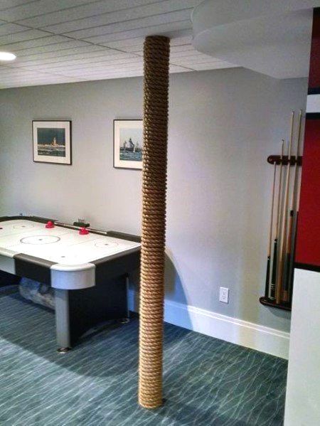 Discover how to hide unsightly support beams and steel posts with the top 50 best basement pole ideas. Explore unique downstair column cover designs. Basement Pole Ideas, Basement Pole Wrap, Basement Pole Covers, Basement Poles, Small Basement Remodel, Column Covers, Basement Inspiration, Diy Basement, Waterproofing Basement