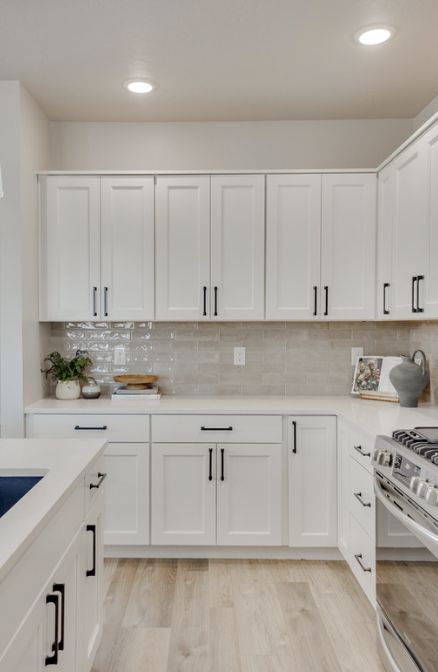 Farmhouse Kitchen Light Floors, White Kitchen Small Apartment, Wood Floor With White Cabinets, White Counter Tops With White Cabinets, White Cabinets Wood Floor Kitchen, Kitchen Remodel Oak Floors, New White Kitchen, Small White Cabinet Kitchen, Minimalist White Kitchen Design