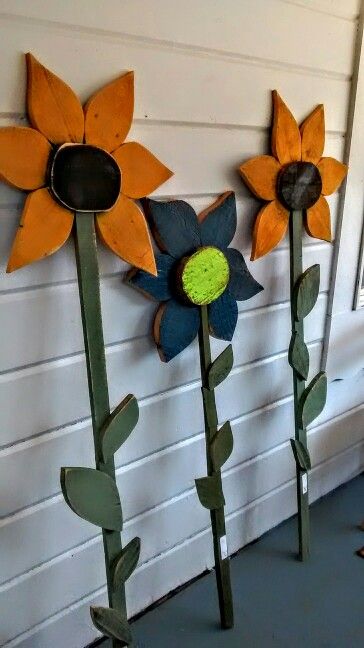 Wooden flowers Wood Garden Flowers, Fall Wood Flowers, Wooden Flower Decor, Wooden Flowers Diy Garden Art, Summer Wooden Crafts, Spring Wooden Crafts, Wooden Yard Decor, Wooden Flowers Diy, Spring Wood Crafts To Sell