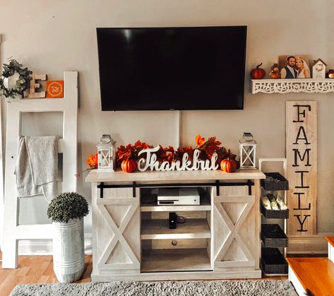 Fall Tv Table Decor, Fall Mantle Decor Under Tv, Tv Stand Decor For Fall, Tv Entertainment Center Fall Decor, Fall Decor Ideas For The Home Mantle With Tv, Fall Decor On Entertainment Center, Fall Decor Console Table Under Tv, Halloween Decor For Tv Stand, Fall Decor Living Room Tv Stand