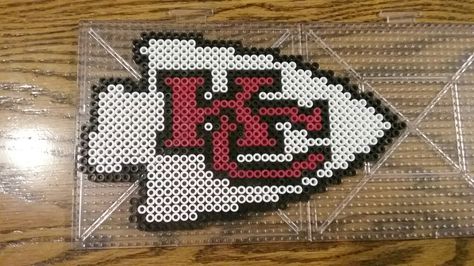 Kansas City Chiefs Perler Bead Kansas City Chiefs Perler Bead Patterns, Football Team Perler Bead Patterns, Kansas City Chiefs Perler Beads, Sports Perler Bead Patterns, Chiefs Perler Beads, Kc Chiefs Perler Beads, Kansas City Chiefs Crafts Diy, Nfl Perler Beads Pattern, Football Perler Bead Patterns