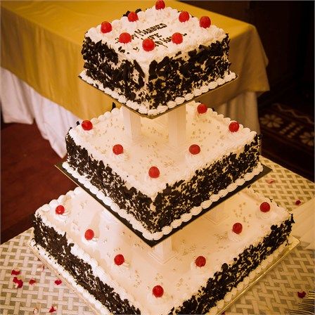 3 tier black forest wedding cake http://intimatematrimony.com/ Black Forest Cake Decoration Square, Black Forest Wedding Cake, 3 Tier Square Cake, Two Tier Chocolate Cake, Black Forest Wedding, Black Forest Cake Decoration, Forest Wedding Cake, Wedding Cake Forest, Taj Hotel