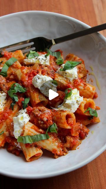 Kristen Faith on Instagram: "Tomato Basil Rigatoni with Burrata 🍝

Recipe on my Substack! Link in bio 🔗

Olive oil: @getgraza 
Rigatoni: @raoshomemade 
Sausage: @angelocaputosfreshmarkets 

#tomatobasilsauce #rigatoni #pastarecipe #recipe #springrecipe #burrata #yum" Rigatoni Burrata, Rigatoni With Sausage And Tomato Cream Sauce, Rigatoni With Roasted Cherry Tomatoes And Burrata, Creamy Tomato Rigatoni, Bursting Tomato Burrata Pasta, Sausage Rigatoni, Burrata Recipe, Rigatoni Recipes, Tomato Basil Sauce