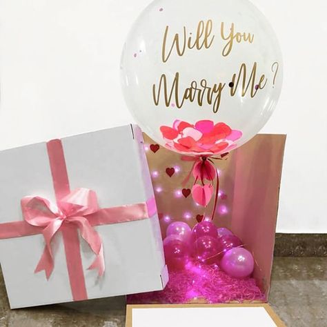 Creative Ideas Ltd on Instagram: "To all BALLOON ARTISTS - this one is especially for you! - BLANK ‘WILL YOU MARRY ME’ SURPRISE BOXES 18”x18”x24” - $150 - You can fill these boxes with your own lovely balloon bouquet and top it off with a matching bow and decal! - Great for: • Wedding Proposals • Birthdays • Anniversaries • Gender Reveals - DM for more info WhatsApp (only) 684-9133 - Special order item: 1. Confirm item 2. Make payment 3. Curbside pickup at El Socorro office or delivery send-out Will You Marry Me Ideas Proposals, Marry Me Surprise, Gender Reveal Box, Dream Proposal, Balloon Surprise, Balloon Basket, Engagement Decor, Anniversary Surprise, Balloon Box