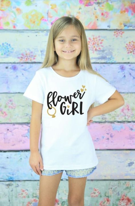 Here is a graphic tee that is the perfect combination of trendy and cute for your little flower girl! Graphics are adhered to each shirt using a heat transfer process for durability and long-lasting wear. Designs are printed onto the shirts by hand and each shirt is made to order here in Northern Bride And Groom Tshirts, Daughter Of The Bride, Wedding Day Shirts, Flower Girl Shirt, Bridal Apparel, Flower Girl Shirts, 2nd Birthday Shirt, Sisters Wedding, Wedding Party Shirts