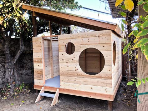 Modern playhouse with circle windows and textured floor | COOLGUYRANDO Castle Playhouse, Modern Playhouse, Backyard Fort, Backyard Playset, Playhouse Plans, Diy Playhouse, Playhouse Outdoor, Play Structure, Backyard Playground