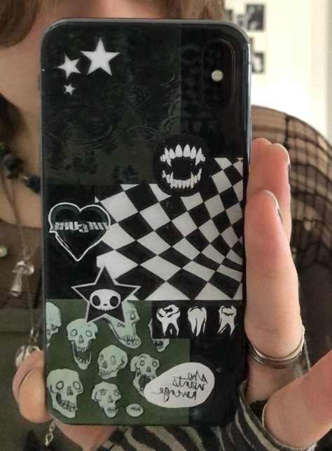 A person holding a phone in a mirror. There are multiple dark green cut out pictures on the back of their phone. Green Phonecases Aesthetic, Dark Phone Cases Aesthetic, Fairy Grunge Phone Case, Alt Phone Cases, Clear Phone Case Ideas Aesthetic Grunge, Phone Cases Grunge, Dark Green Stickers, Phone Cases Aesthetic Grunge, Green Phone Case Aesthetic