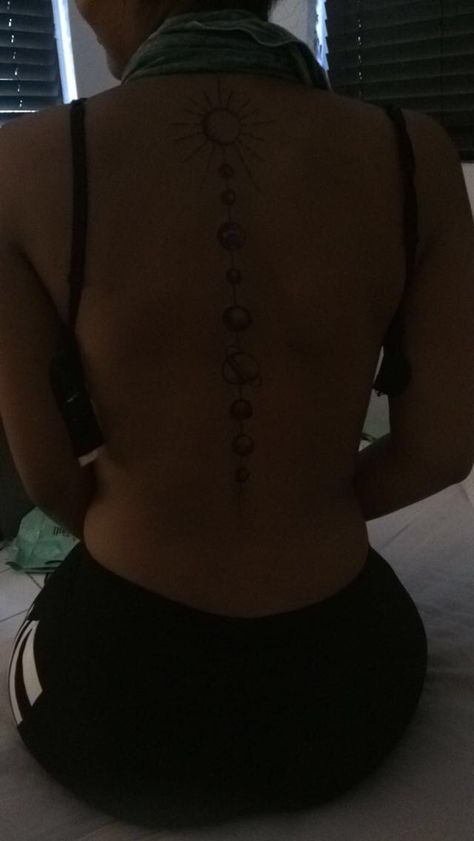 Planet Back Tattoo Women, Back Planet Tattoo, Back Tattoo Women Solar System, Back Tattoo Women Planets, Saturn Back Tattoo, Planet Tattoos Spine, Planets Down Spine Tattoo, Spine Tattoos For Women Astrology, Space Themed Spine Tattoo