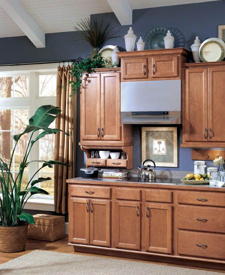 Blue Kitchen Walls Oak Cabinets, How To Decorate Above Cabinets, Navy Kitchen Walls, Blue Kitchen Walls, Wellborn Cabinets, Decorating Above Kitchen Cabinets, Above Cabinets, Above Kitchen Cabinets, Navy Walls