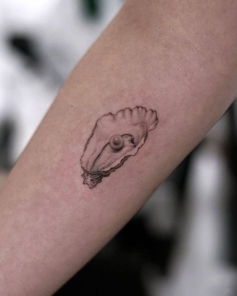 Micro-realistic oyster tattoo located on the inner Pearl And Oyster Tattoo, Lost At Sea Tattoo, Oysters Tattoo, Food Tattoo Sleeve, Shell Hand Tattoo, Small Oyster Tattoo, Pearl Clam Tattoo, Oyster Tattoos, Shell Pearl Tattoo