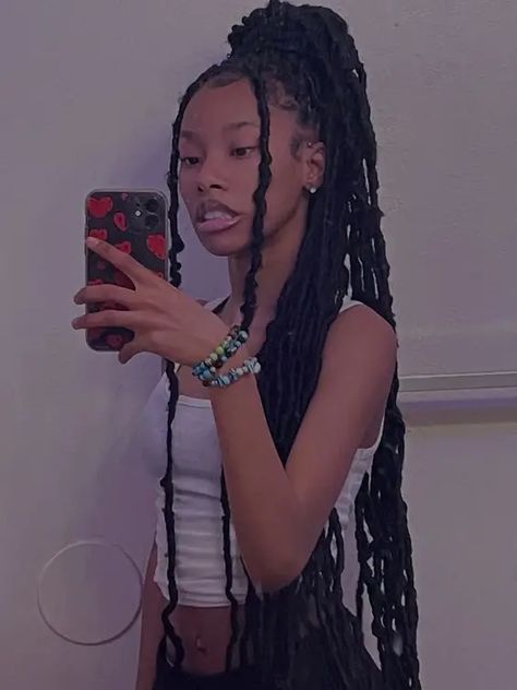 Soft Locs: 45 Gorgeous Inspos to Elevate Your Style Game Soft Locs Hairstyles Aesthetic, Cute Styles For Faux Locs, Soft Locs In A Ponytail, Soft Locs Hairstyles Ponytail, Hairstyles For Locs Black Women, Half And Half Soft Locs, Styles To Put Your Soft Locs In, Soft Locs Ponytail Styles, Soft Loc Updo Styles Long