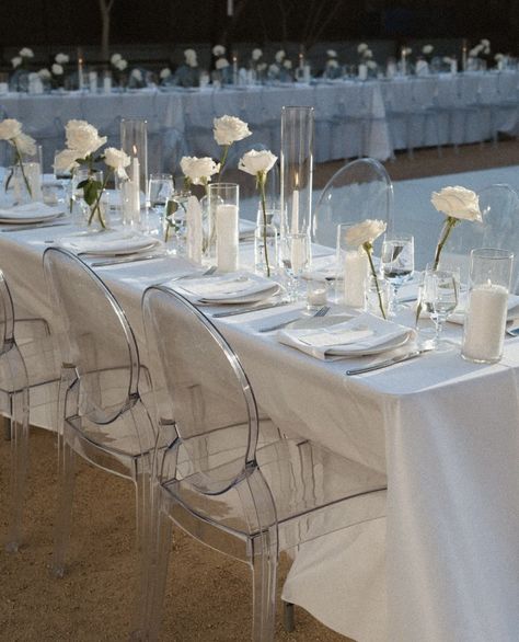 Simple Modern Wedding Aisle, White Chairs And Tables Wedding, Classic Modern Wedding Reception, Modern Wedding Candles, White Roses Hanging From Ceiling Wedding, Elegant Arch Wedding, White Roses Candles Wedding, White Rose Reception Decor, White Minimal Wedding Decor