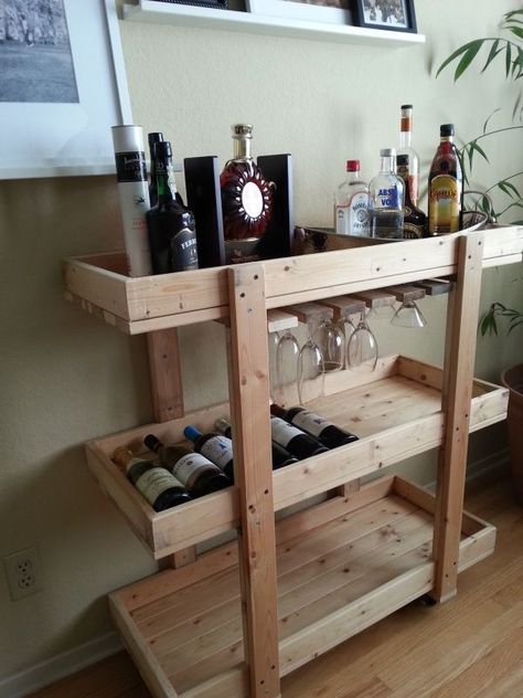 14 Inspiring DIY Bar Cart Designs And Makeovers-worth checking out to see if there are any that particularly appeal to you. Ideas De Mini Bar, Bar Cart Design, Wood Bar Cart, Diy Bar Cart, Bar Mini, Gold Bar Cart, Diy Home Bar, Wine Rack Cabinet, Bar Cart Styling