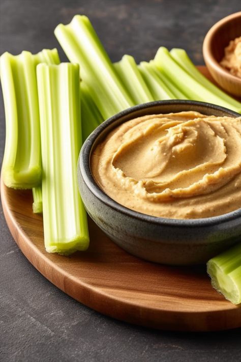 A simple and nutritious keto-friendly snack. Crisp celery stalks provide a satisfying crunch while almond butter adds a creamy and nutty flavor. It's a perfect combination of textures and tastes that will keep you satisfied between meals. Celery is low in calories and carbs, making it an excellent choice for those following a keto diet. Celery Sticks, Healthy Snack Options, Snack Options, Almond Butter, Celery, Keto Diet, Healthy Snacks, Almond, Butter