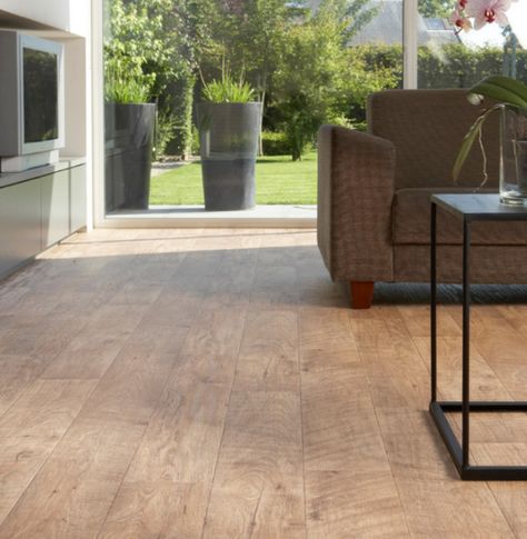 ide range of price points. They provide the same warm look as real hardwood but without the maintenance. Because of their moisture-resistant wear layers, the durable flooring can be installed in just about any room, including wet areas like bathrooms, kitchens, and laundry rooms. Cleaning is simple with a good sweep from a soft-bristled broom or vacuum, and food stains can be wiped up with a little baking soda paste and non-abrasive sponge. Luxury Vinyl Planks, Vinyl Planks, Food Stains, Flooring Store, Durable Flooring, Waterproof Flooring, Heated Floors, Radiant Heat, Vinyl Plank Flooring