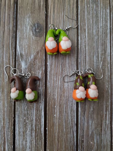 These beautiful fall gnome earrings are for anyone. This is great for fall and great for Thanksgiving. These earrings make great gifts for anyone! Clay gnome dangle earrings. Small size. Cute earing perfect gift. - Clay - Silver earring hooks to order 1. Choose which color gnome number are in picture. Second picture  2. place order 3. wait and receive to enjoy Simply Clay Bee Gnome Earrings, Winter Gnome Clay Earrings, Gnome Earrings For Christmas, Simply Clay Gnome Earrings, Crocheted Gnome Earrings, Christmas Gonk Earrings, Polymer Gnome Earrings, Polymer Clay Gnomes Earrings, Gnomes Earrings