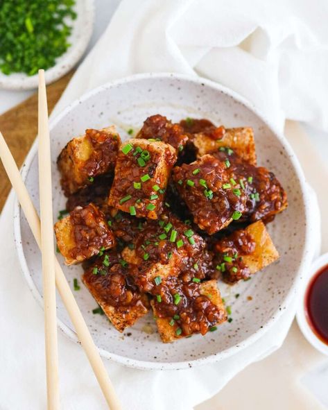 Listen, I know tofu doesn’t get the best reputation, but just hear me out on this one — THIS crispy tofu recipe is the one to change your mind! Not only is this crispy tofu just insanely tasty, it’s easy too! You’re going to want to put this sauce on everything! What You’ll Need: 16 Ounces Extra Firm Tofu 1 Tablespoon + 1 Teaspoon of Cornstarch 1/4 Teaspoon Garlic Powder 1/4 Teaspoon Onion Powder 2 Tablespoons Canola Oil (or another neutral… Chopstick Meals, Best Crispy Tofu, Pumpkin Monkey Bread, Glazed Tofu, Tofu Wraps, Soy Glaze, Firm Tofu, Tofu Recipe, Honey Soy