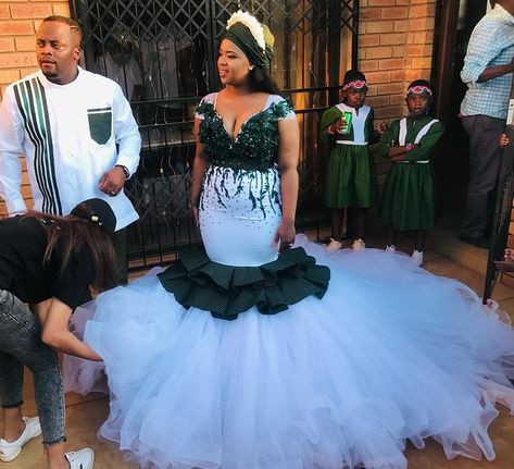 BMashiloDesigns on Instagram: “Our bride asked for a crisp white traditional wedding dress with a touch of emerald green seshweshwe 🥰 👗: @bmashilodesigns 👕:…” White Traditional Wedding Dress, Shweshwe Material, Wedding Dresses South Africa, Seshoeshoe Dresses, South African Wedding Dress, Xhosa Traditional Dresses, African Print Wedding Dress, Xhosa Attire, South African Traditional Dresses