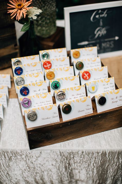 Need wedding ideas? Check out this beer bottle cap escort cards and see more inspirational photos on TheKnot.com. Beer Garden Wedding, Craft Beer Wedding, Wedding Planning Organization, Beer Themed Wedding, Wedding Planning Organizer, Planning Organization, Beer Wedding, White Veil, Brewery Wedding