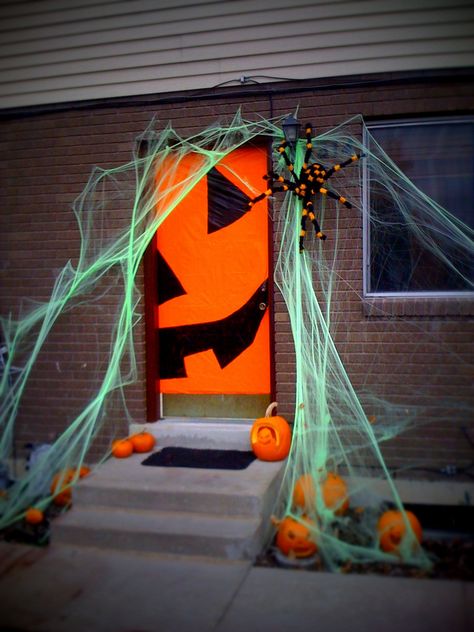 The spider awaits its next meal of happy li'l hobbits | Flickr Door Design Halloween, Hollween Decor Classroom Door, Spiderweb Door Decoration, Puerta Halloween, Door Monster Halloween, Halloween Monster Door Decorations, Spooky Diy Halloween Decor, Outdoor Halloween Parties, Spooky Halloween Crafts