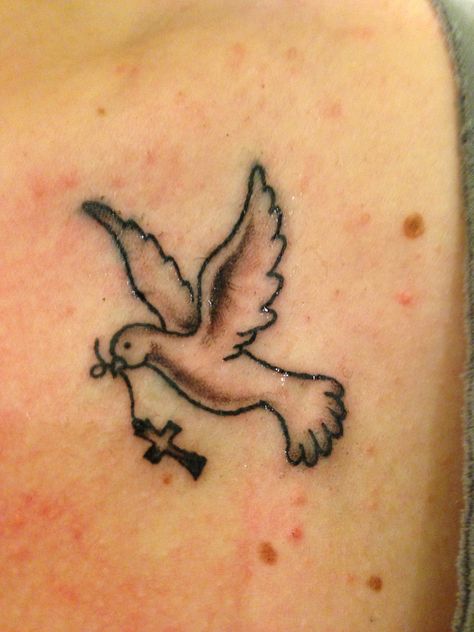 Dove tattoo carrying cross Dove Tattoo With Initials, Cross Bird Tattoo, Cross And Dove Tattoos For Women, Cross With Birds Tattoo, Dove And Cross Tattoo, Dove Tattoo Meaning, White Dove Tattoos, Cross Heart Tattoos, Small Dove Tattoos