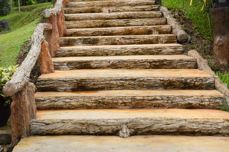 If you want to construct steps out of a dirt slope, all you need is an effective landscaping tool that is safe and easy to climb. It just takes a few hours one afternoon. How To Build Stairs Outdoors, Outdoor Stairs Hillside, Diy Steps On A Slope, Outdoor Steps On A Slope, Landscape Stairs, Landscaping Tools, Garden Stairs, Outdoor Steps, Wooden Steps