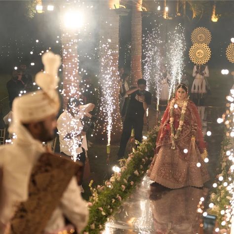 The nervous flutter in your heart, the dazzling fireworks painting the night sky, and breathtaking aesthetics decor that leave you speechless. This is what a truly unforgettable bridal entrance feels like.😍 Lets plan one such entry for you💫 . . . . . . . . #indianwedding #weddingplanner #weddingdecor #ahmedabadweddingplanner #weddingplannerinahmedabad #hastmelapweddings #bridalentry #bridesday #fireworks #weddingentry [ Event planning | Event Decor | Reception | Ahmedabad | Wedding planner | ... Cold Fire Wedding Entry, Fireworks Painting, Bridal Entrance, Fire Wedding, Wedding Entry, Firework Painting, Bridal Entry, Christian Wedding, Night Painting