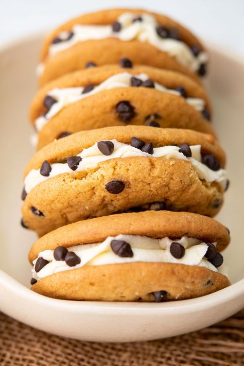 Learn how to make the best ever chocolate chip sandwich cookies! This recipe features two soft and chewy cookies with rich buttercream frosting sandwiched between. Chocolate Chip Cookie Sandwich, Chocolate Chip Sandwich Cookies, Chip Sandwich, Chocolate Cheesecake Bites, Chocolate Chip Frosting, Cookie Sandwich Recipes, Cookie Sandwich, Chewy Cookies, Diy Desserts